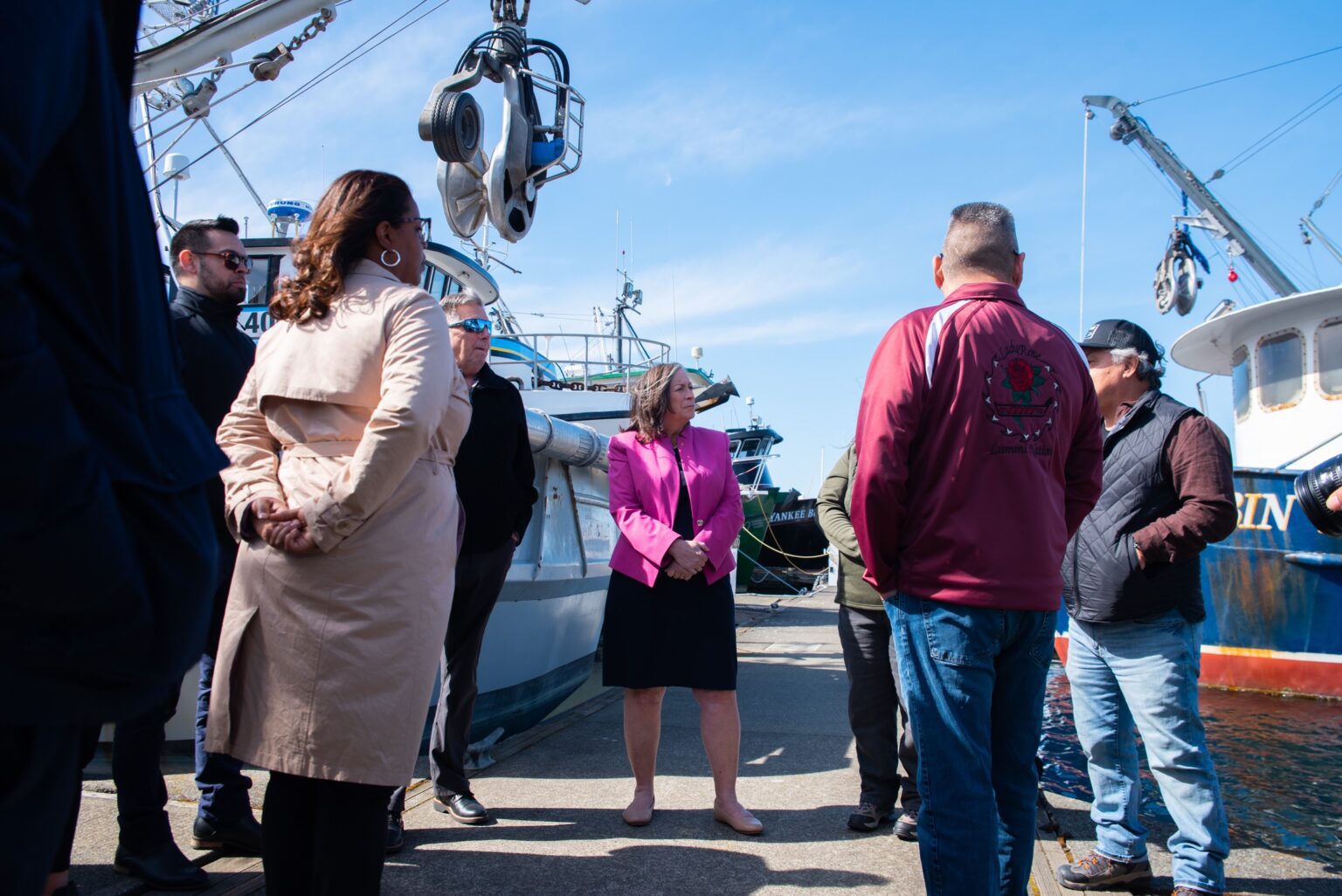U.S. Treasurer Marilynn Malerba listens to members of the Lummi Indian Business Council talk March 28 about Lummi fishing vessels at Squalicum Harbor.
