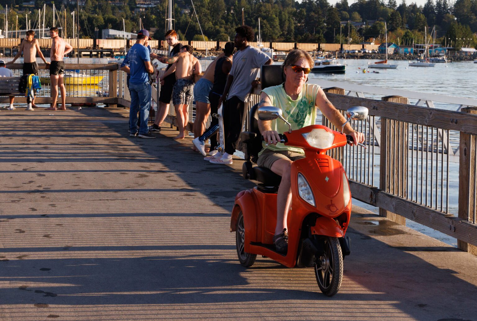 Todd Sharp drives his e-wheel along Taylor Dock on Aug. 17. Sharp