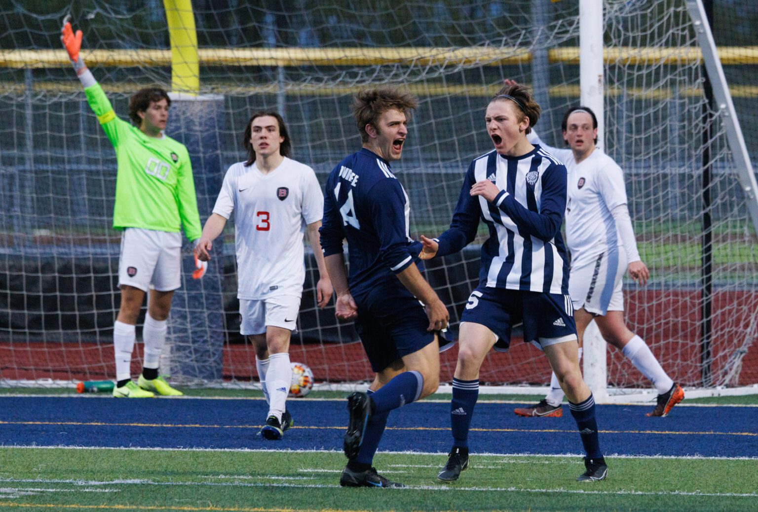 Squalicum's Joshua Durfee (14) cheers after scoring a goal as Squalicum beat Bellingham 2-0 in a matchup of the Northwest Conference leaders on April 20 at Squalicum High School.