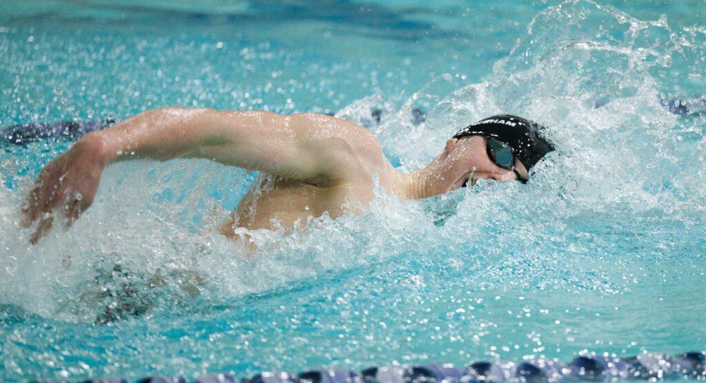 Bellingham's Miles Cratsenberg powers himself through the water as it splashes back at him during the race.
