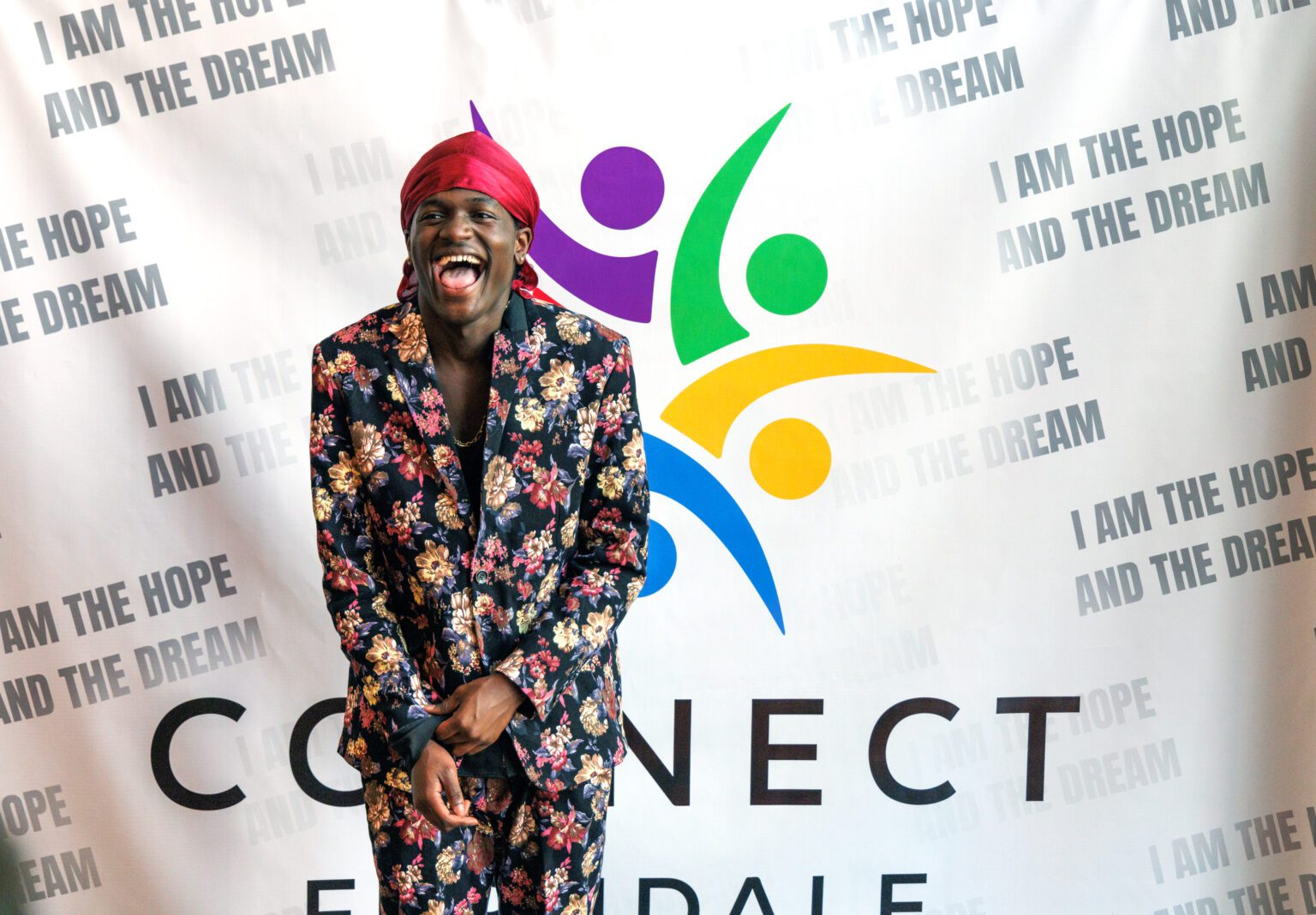 Isaac Gammons-Reese laughs as he gets a photo taken during an event celebrating the release of a Juneteenth video project headed by Connect Ferndale