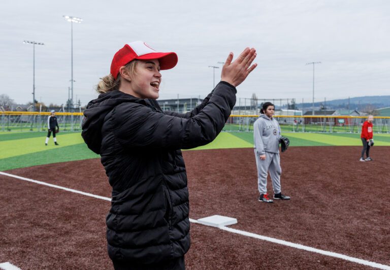 Kaeli Andersen coaches the Bellingham softball team on March 11. Andersen is a full-time student at Western Washington University and a 2018 Squalicum graduate.