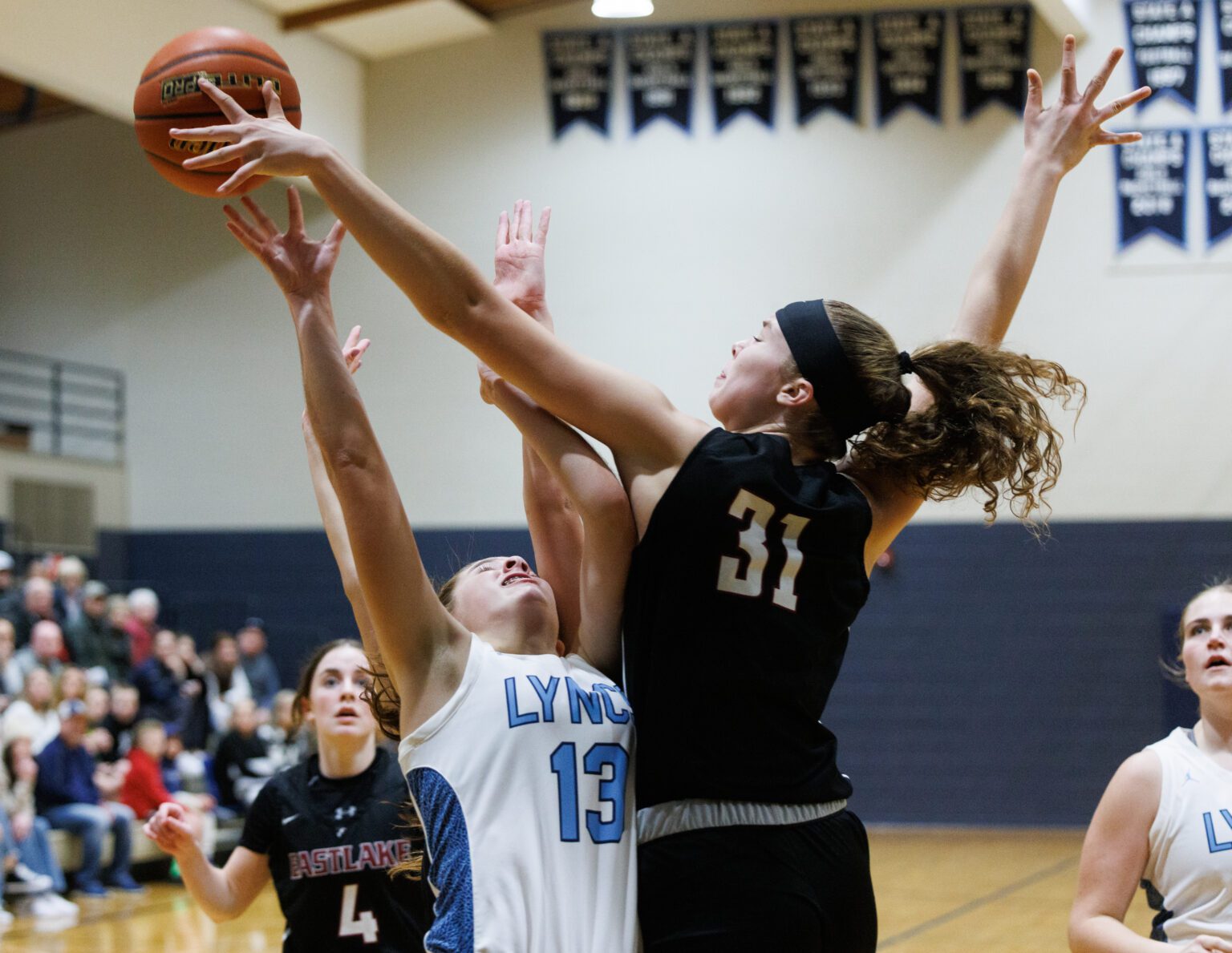 Eastlake’s Ava Schmidt gets a hand on a shot by Lynden Christian’s Grace Hintz as the Lyncs suffered their first loss of the season