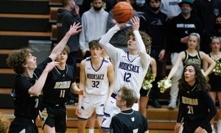 Nooksack Valley's Bennett DeLange hits a jump shot as Nooksack Valley beat Meridian 58-36 in a boys basketball game on Feb. 10.
