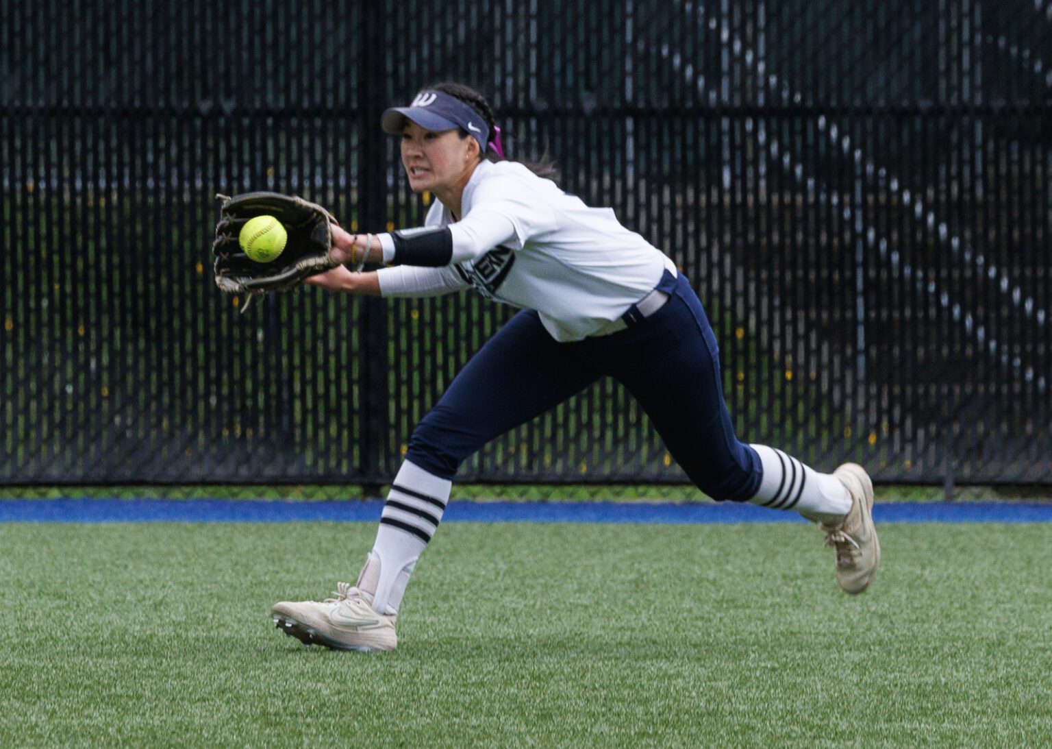 Western Washington University’s Lauren Lo makes a running catch in the outfield as the Vikings took on Saint Martin’s during a game on April 29.