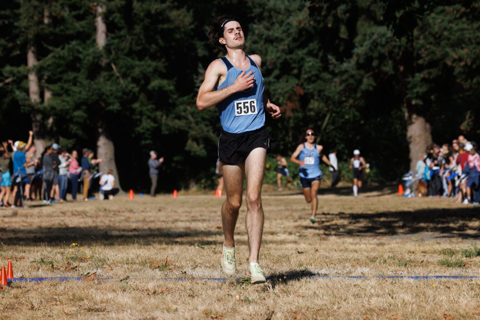 Western Washington University’s Kevin McDermott crosses the finish line for third place as teammate Andrew Oslin takes fourth in the Bill Roe Classic at Hovander Homestead Park on Sept. 24.