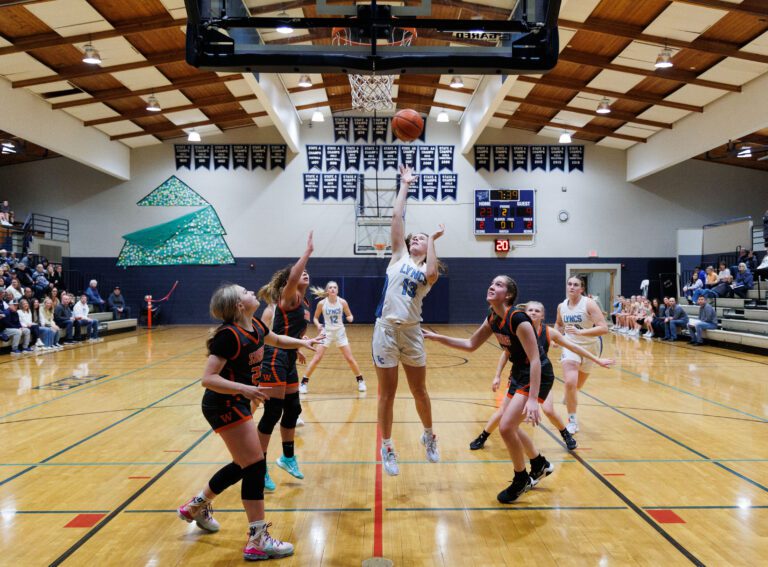 Lynden Christian’s Grace Hintz scores two of her 18 first-half points as the Lyncs defeated Washougal 72-30 in the first round of the Lynden Christmas Classic on Dec. 28.