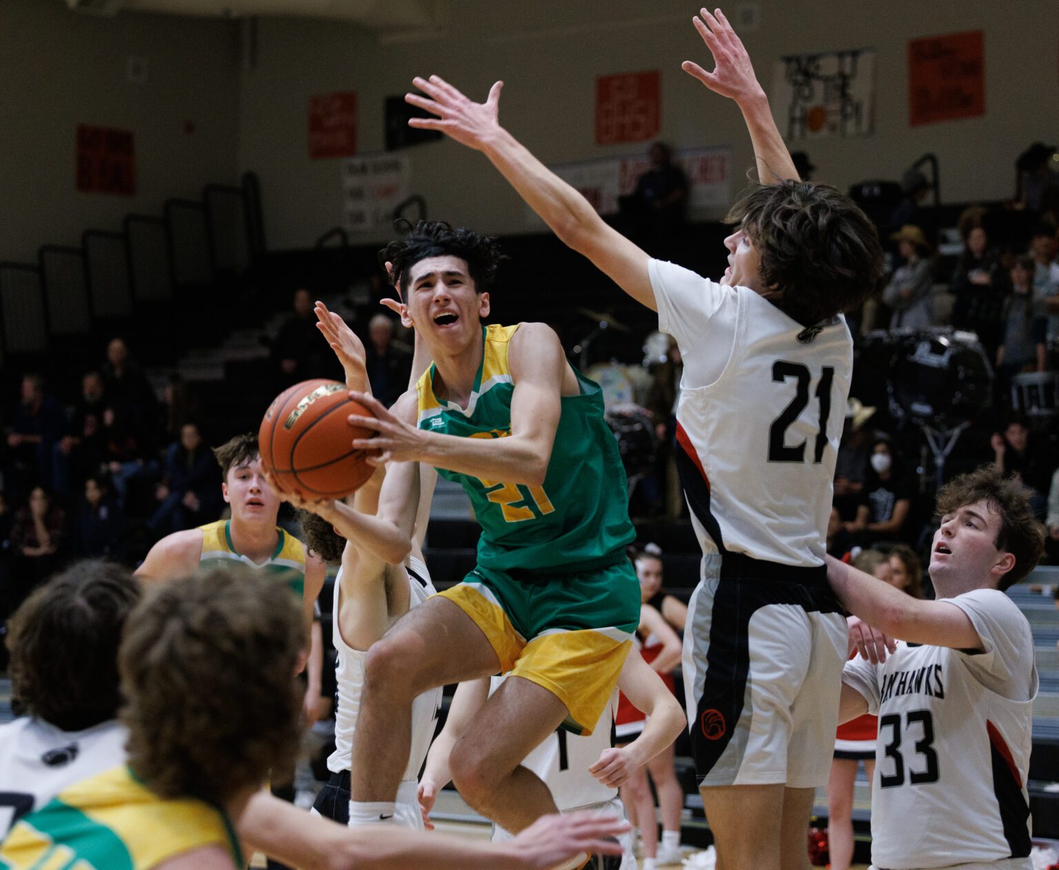 Lynden’s Anthony Canales leaps and throws up a shot as Bellingham’s Kincade Vanhouten looks for a block in the first half. Lynden beat Bellingham 69-44 on Jan. 5.