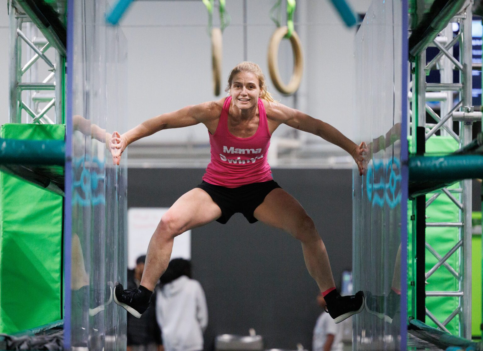 Heather Nelson climbs through the spider wall at Life Force Ninja on March 26. Nelson recently competed for the TV program "American Ninja Warrior" in San Antonio