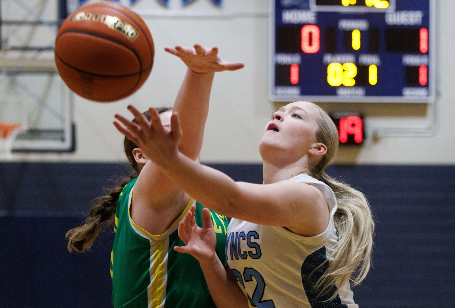 Lynden Christian's Reganne Arnold finger rolls the ball to the basket Feb. 4 as the Lyncs hosted Lynden in an annual rivalry matchup. The Lyncs won 58-50.