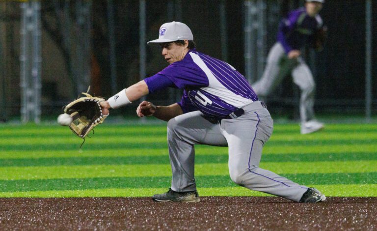 Nooksack Valley's Jacob Tresselt makes a backhanded catch as Nooksack Valley beat Bellingham 2-1 on March 24.