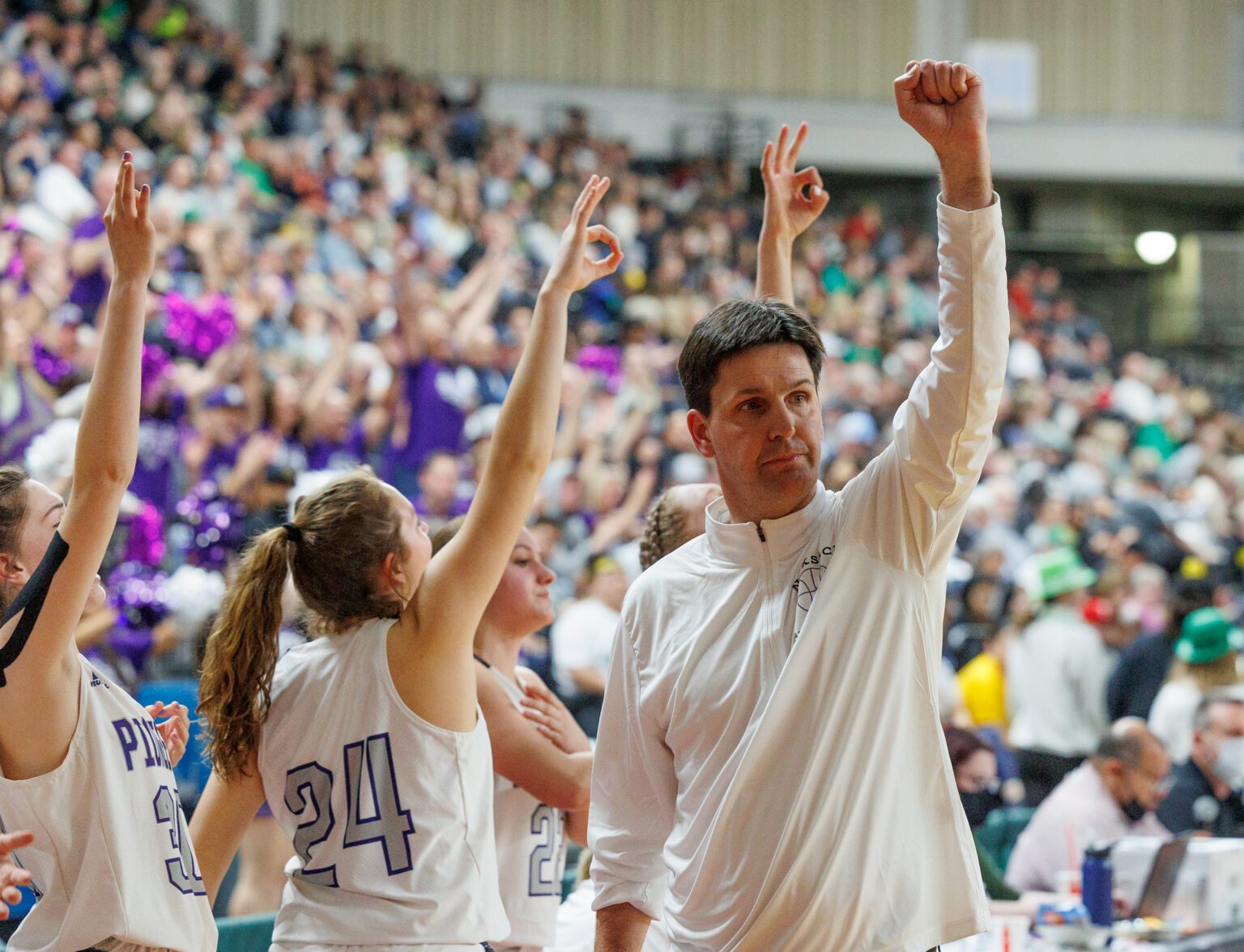 Nooksack Valley head girls basketball coach Shane Wichers holds up a fist after a player makes a 3-pointer in a state quarterfinal game versus Wapato on March 3.