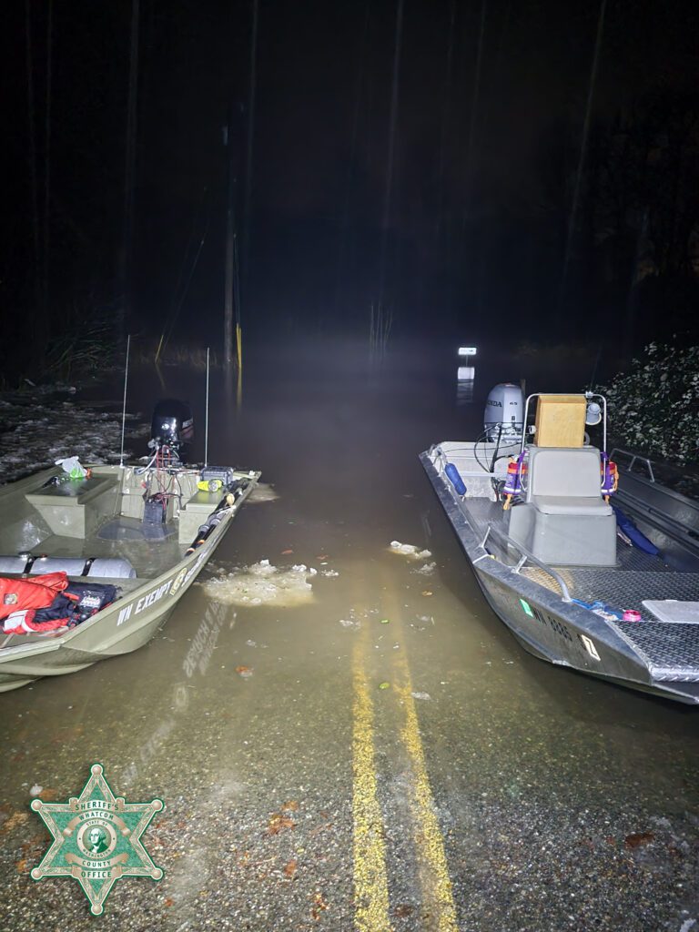 Six residents and five dogs were rescued Dec. 25 from their homes in Marietta as flooding began due to ice build-up in the Nooksack River and king tides.