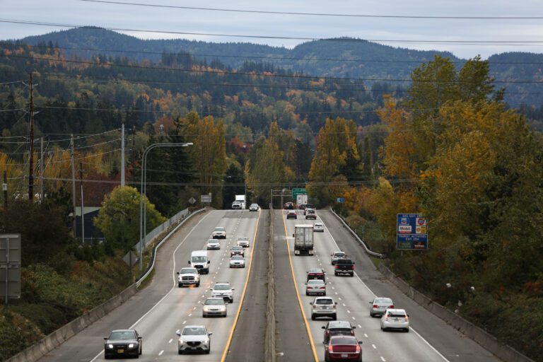 Cars drive along Interstate 5 in October 2021. The 511 phone number