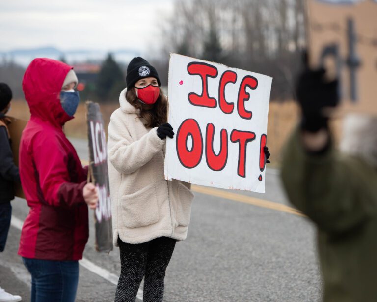 Brenda Bentley from Community to Community Development protests outside the U.S. Immigration and Customs Enforcement facility in Ferndale on Jan. 17.