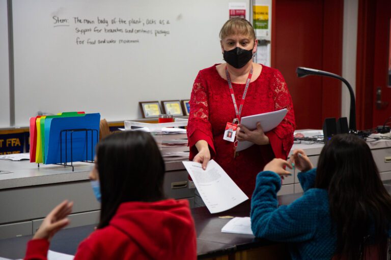 Substitute Nicole Kuklenski hands out assignments while covering an eighth-grade agricultural science class at Mount Baker Junior High on Jan. 18. Kuklenski is a career substitute working through her craziest year yet.