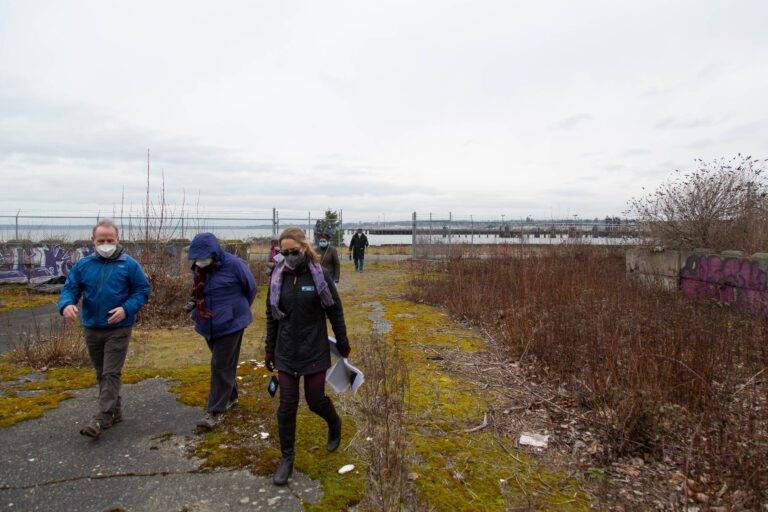 Around two dozen people toured the RG Haley site on the Bellingham waterfront on Feb. 8 with project engineers