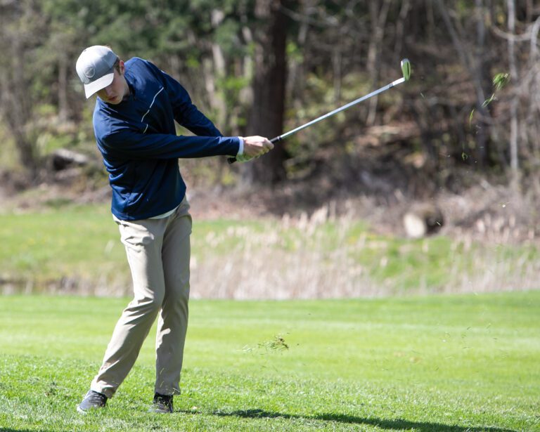 Ferndale's Baylor Larrabee chips a ball off the grass. Larrabee won the individual title at the Birger Solberg Invite.
