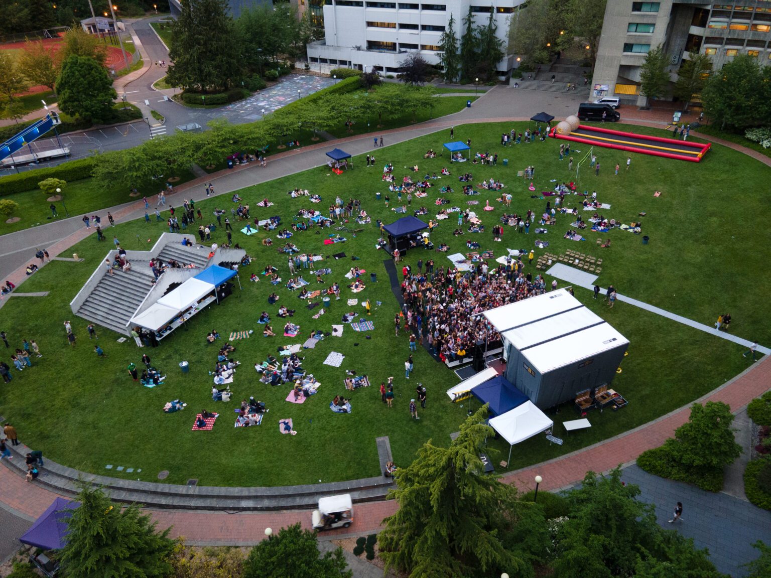 Students cover the lawn and crowd around the stage as the Naked Giants close Lawnstock 2022 at Western Washington University in June. The annual event is put on by Western's Associated Students