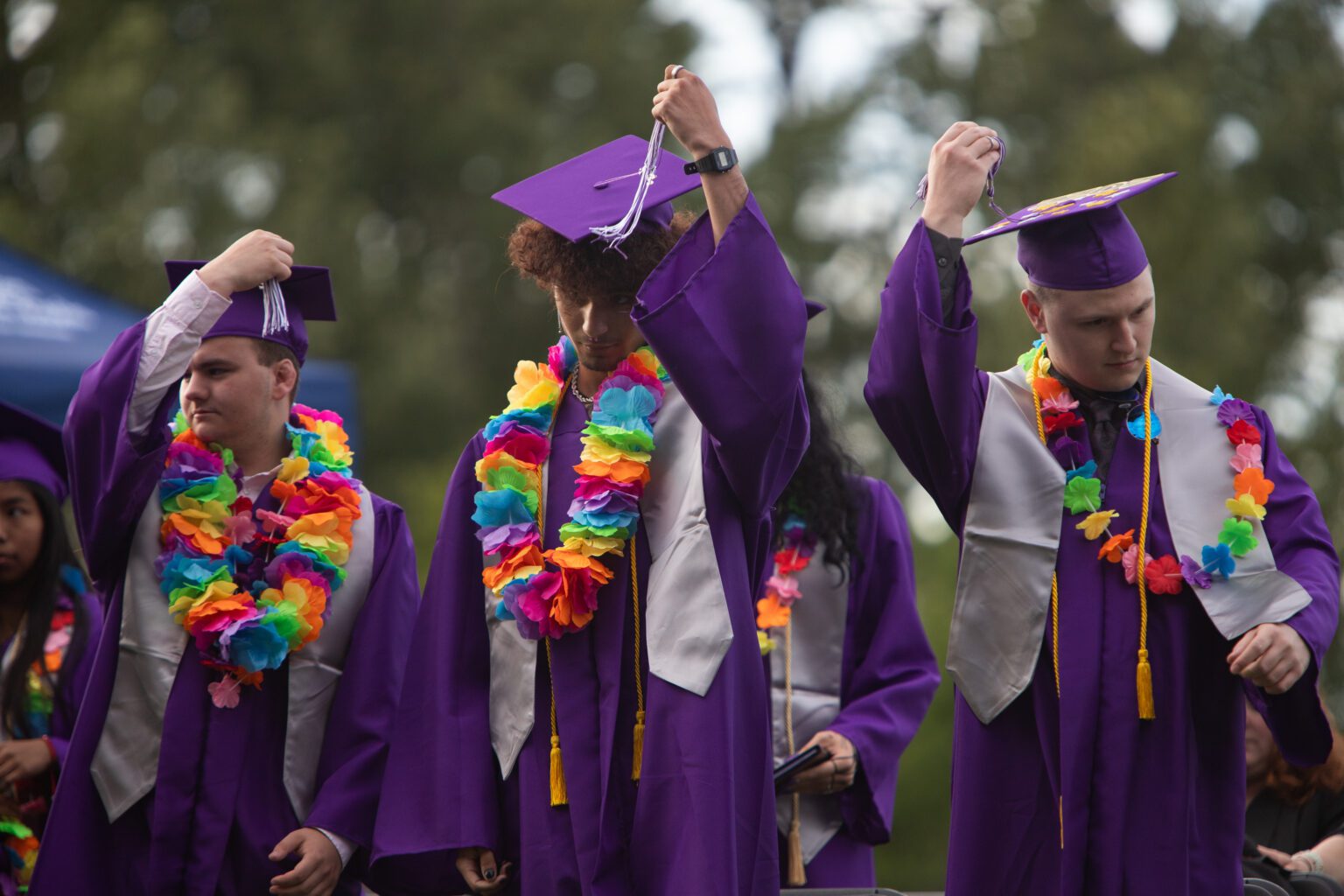 Options High School students turn their tassels in June 2022 during their graduation at Civic Stadium.