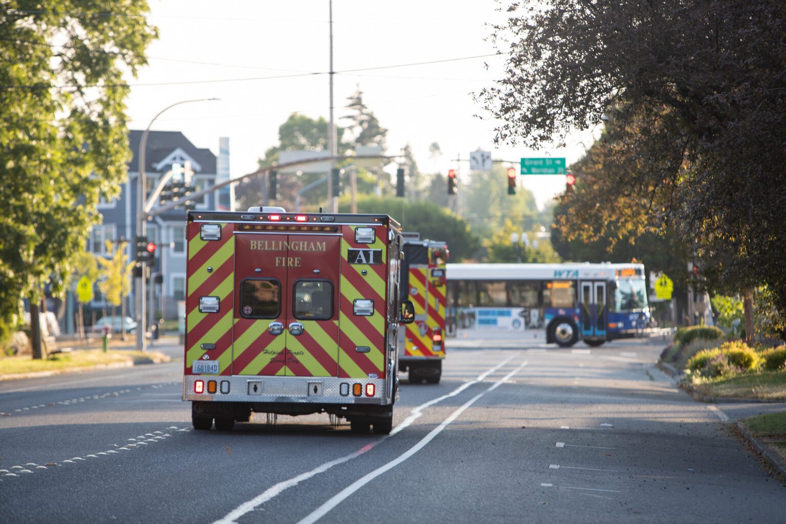 Bellingham Fire Department vehicles drive down Broadway Street on July 26. The department has had modest success recruiting women and people of color