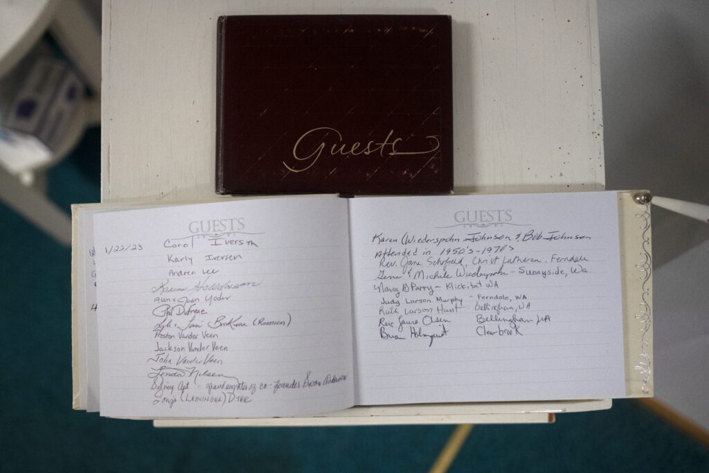 A guest book full of names.