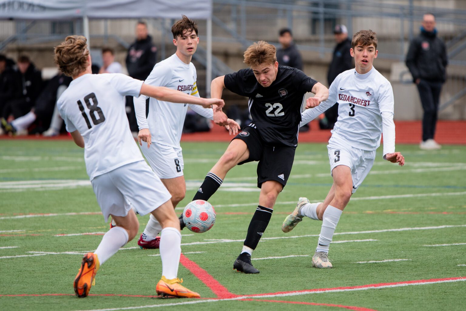 Bellingham junior Judah Straight hits the Bayhawks' second goal of the game May 6 with eight minutes remaining in the first half of a 2-1 win over Cedarcrest in the first round of the 2A District 1 tournament.