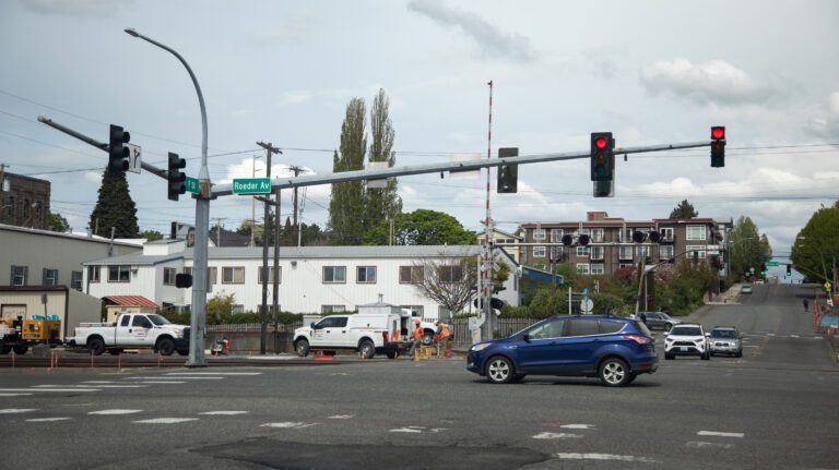 A crew prepares to make improvements to the railroad crossing at F Street and Roeder Avenue in Bellingham on May 8. The crossing is one of six in the city that are being upgraded