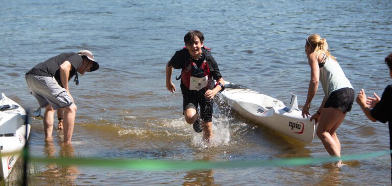 Graysen Gordon of the Junior Beavers races to the finish line May 13 after finishing the kayak leg of Junior Ski to Sea. Gordon is the grandson of Brian Boatman