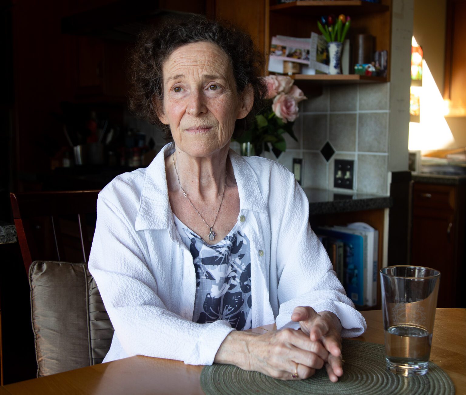 Karen Lerner sits at the kitchen table of her Bellingham home. She has been a PeaceHealth palliative care patient since her cancer diagnosis two and a half years ago. Lerner is switching to remote palliative care through Seattle's Fred Hutchinson Cancer Center because PeaceHealth is reducing its program on May 26. "That was devastating to me