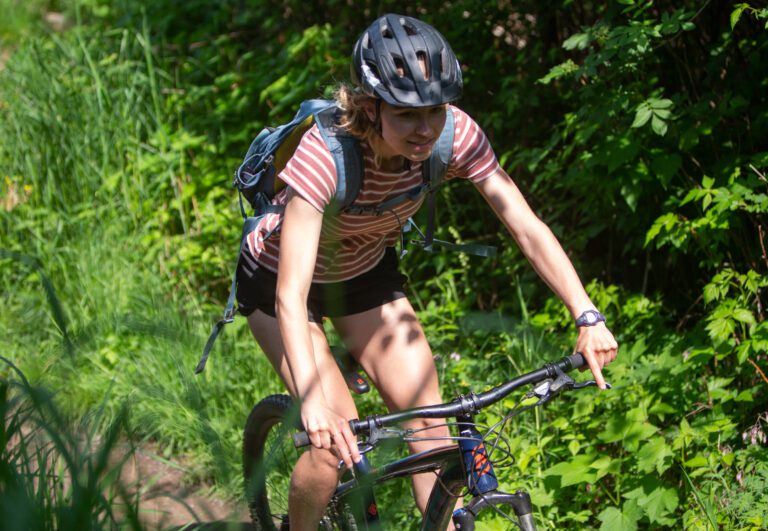 Olivia Palmer mountain bikes down the Karma trail May 25 on the north side of Galbraith Mountain. Everyone is a newcomer to a sport at some point — a reality Palmer came to understand when entering the male-dominated