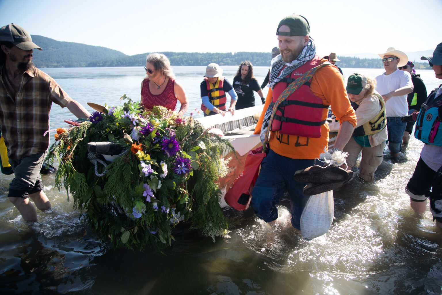 The Octopus Canoe is pulled to shore following the May 26 arrival of the Carvers Camp from Tacoma to the Stommish Grounds of Lummi Nation for the Gathering of the Eagles. Four canoes journeyed for nine days along the “ancestral highway” of the Coast Salish people.