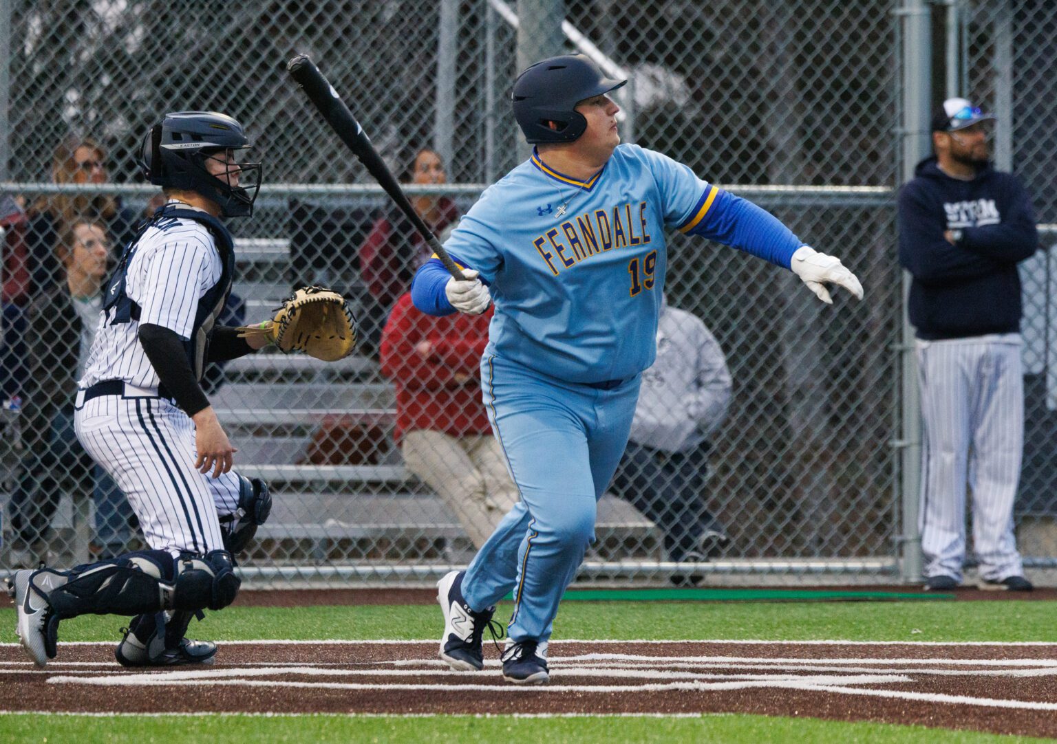 Ferndale's Camden Raymond connects on a Squalicum pitch to drive in a run March 17 during a 9-3 win over the Storm.