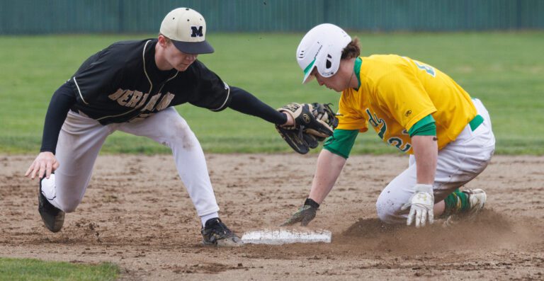Lynden's Campbell Nolte beats the tag by Meridian's Jacob Amundsen at second base April 21 during the Lions' 5-3 league win over the Trojans.