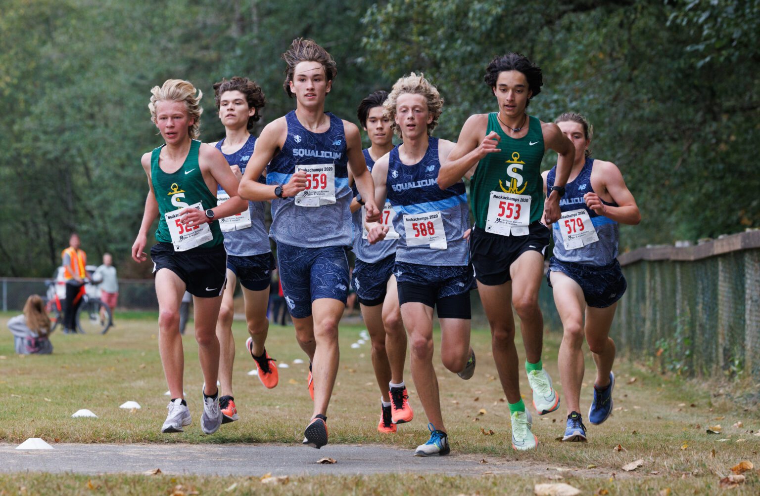The Squalicum boys team race as a pack against Sehome and Bellingham during  a cross country race at Lake Padden on Sept. 28.