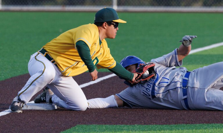 Sehome's Matthew Chen tags out a Sedro-Woolley player at third base. Sehome lost to Sedro-Woolley 7-5 on April 15 in Bellingham.