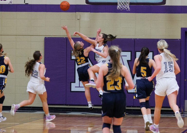 Nooksack Valley’s Taylor Lentz swats away a shot by Burlington-Edison's Analise Slotemaker. Nooksack Valley beat Burlington-Edison 50-38 in a girls basketball game on Jan. 26.