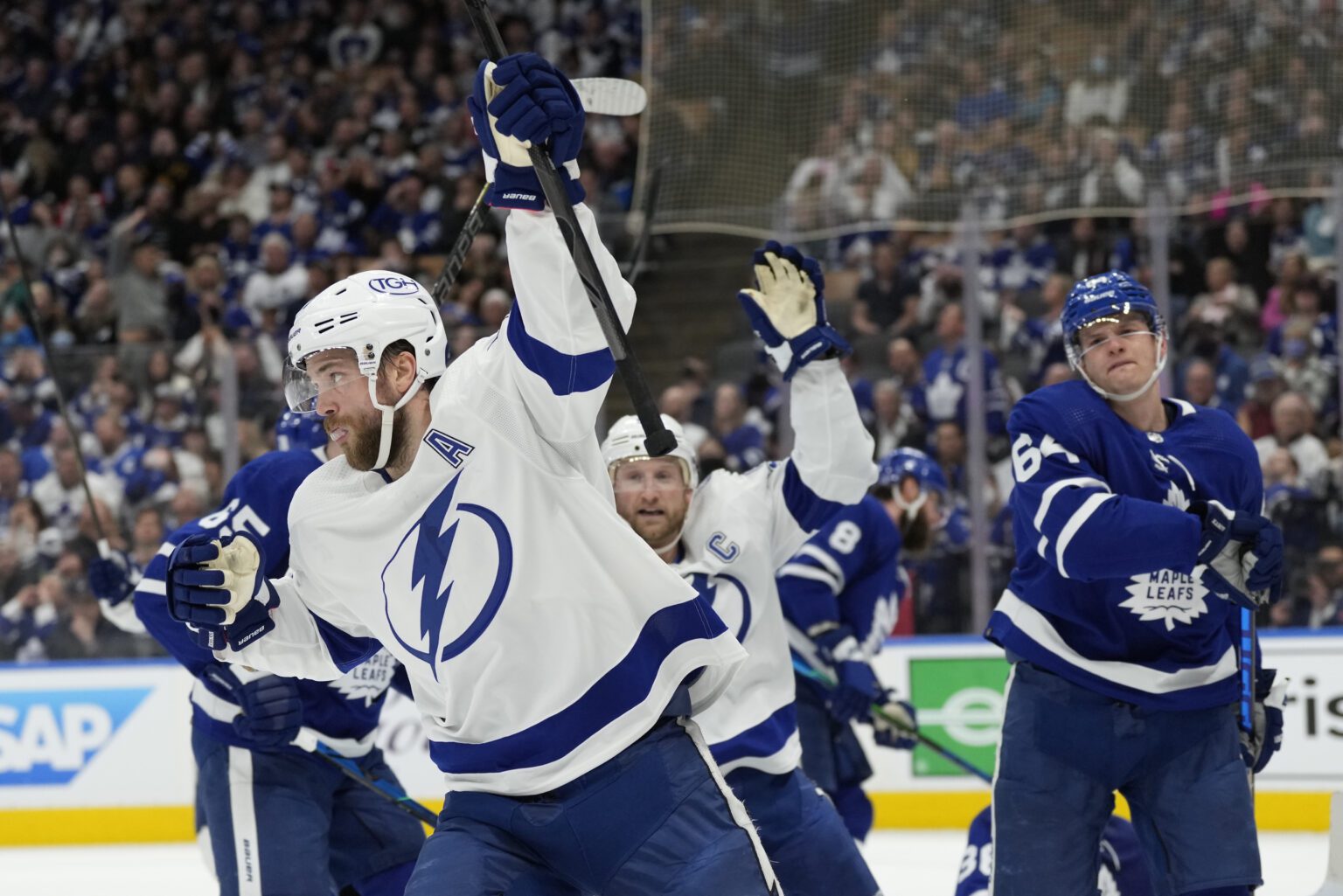 Tampa Bay Lightning defenseman Victor Hedman (77) celebrates his goal against the Toronto Maple Leafs with center Steven Stamkos (91) during the first period of Game 2 of an NHL hockey Stanley Cup playoffs first-round series Wednesday