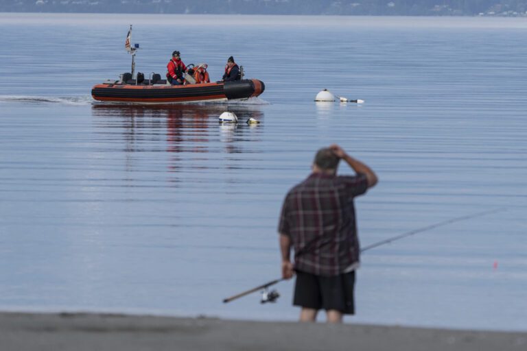 A U.S. Coast Guard vessel searches the area Sept. 5 near Freeland