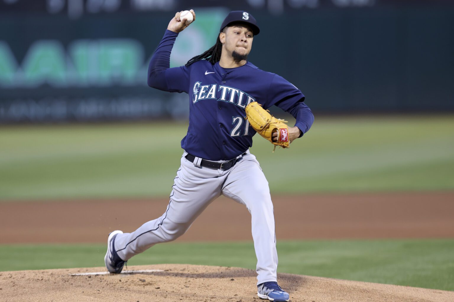 Seattle Mariners' Luis Castillo throws against the Oakland Athletics during the first inning of a baseball game in Oakland