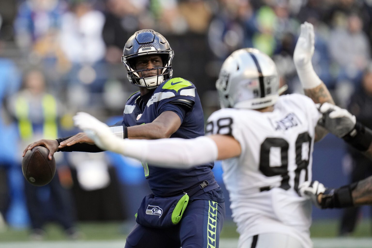 Seattle Seahawks quarterback Geno Smith throws against the Las Vegas Raiders during the second half of an NFL football game on Nov. 27 in Seattle.
