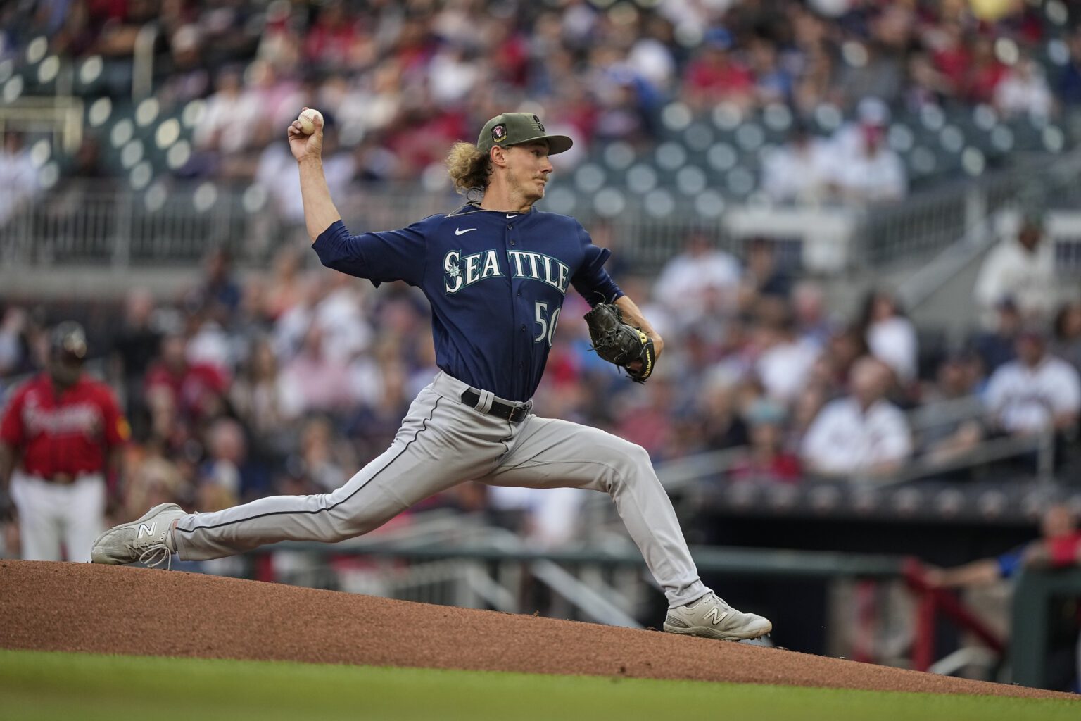 Seattle Mariners starting pitcher Bryce Miller delivers in the first inning of a baseball game against the Atlanta Braves