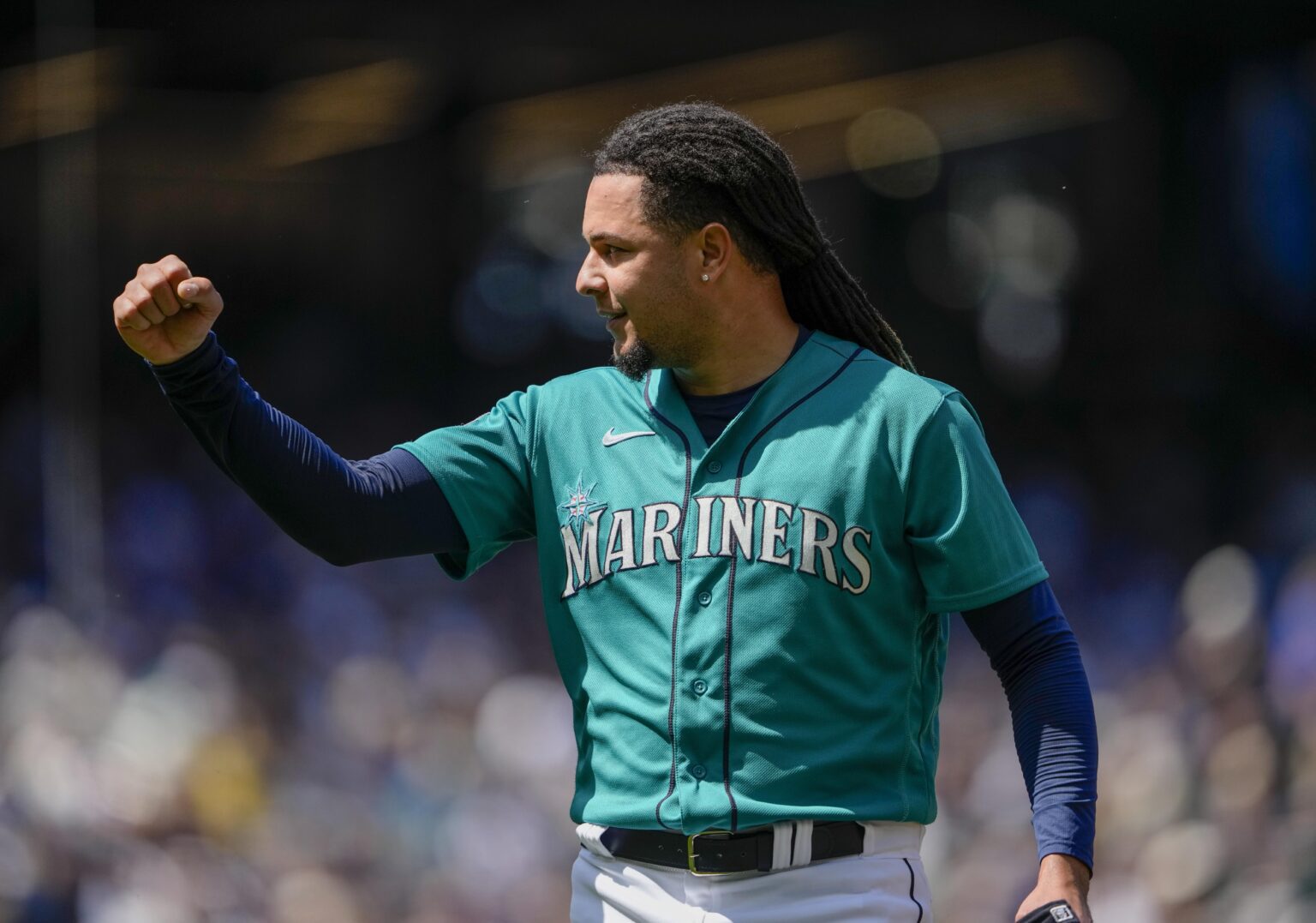 Seattle Mariners starting pitcher Luis Castillo reacts after pitching against the Pittsburgh Pirates during the fifth inning of a baseball game Saturday