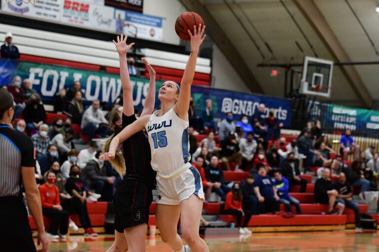 Western Washington University forward Brooke Walling puts up a shot against arch-rival Central Washington in the GNAC Tournament title game in Lacey on Saturday. Western fell 57-46.