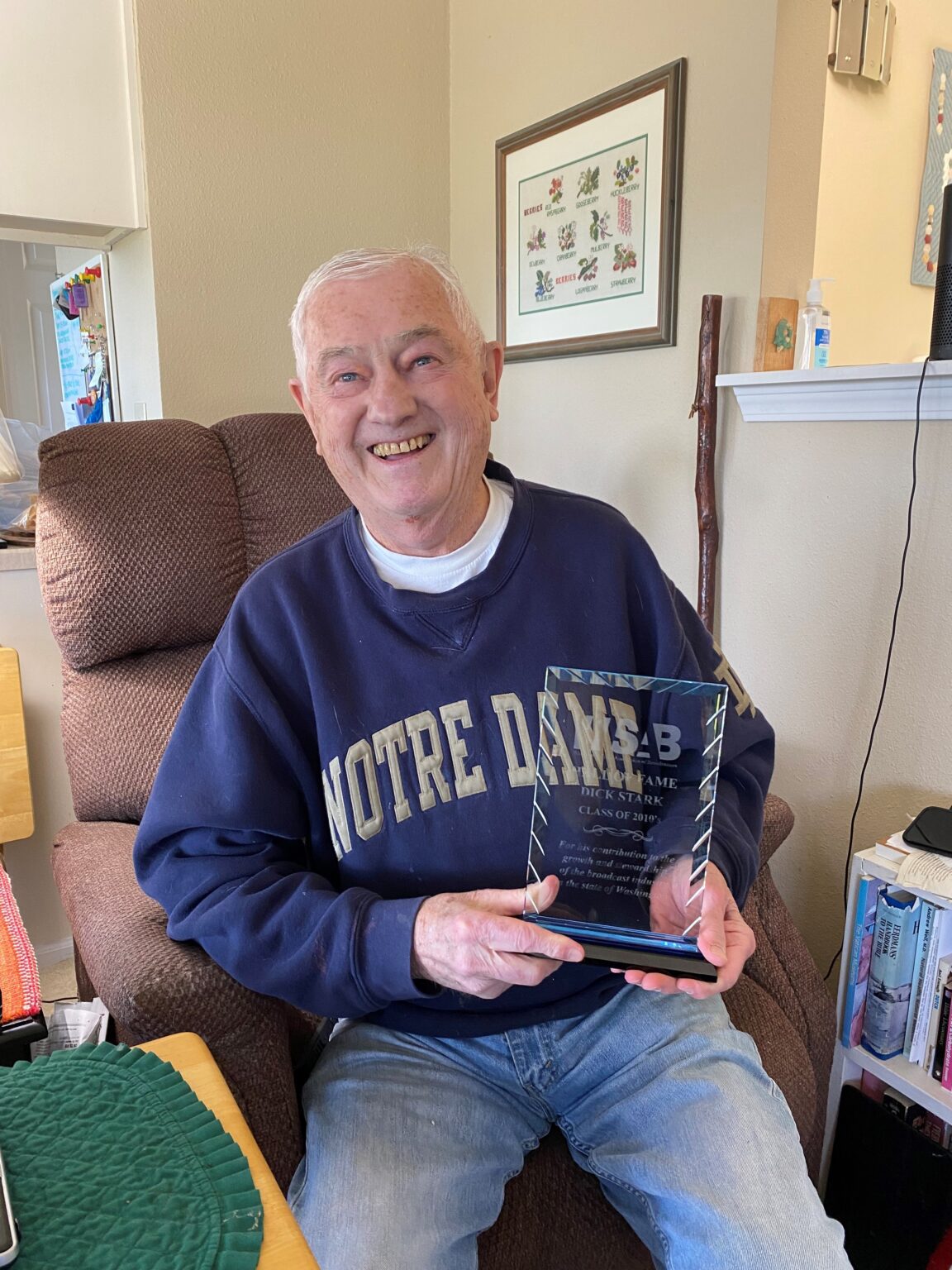 Dick Stark received his Washington State Association of Broadcasters Hall of Fame Award at his home in Bellingham on May 10. The longtime radio broadcaster and Whatcom County youth advocate passed away Tuesday