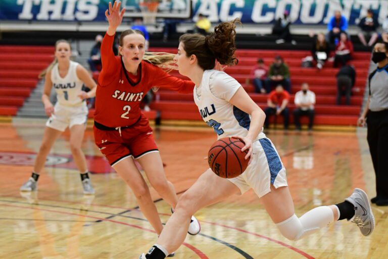 Western Washington University senior guard Emma Duff scored 14 of the Vikings' 20 points in the fourth quarter to turn back an upset bid by No. 9 Saint Martin's in GNAC tournament play Thursday in Lacey.