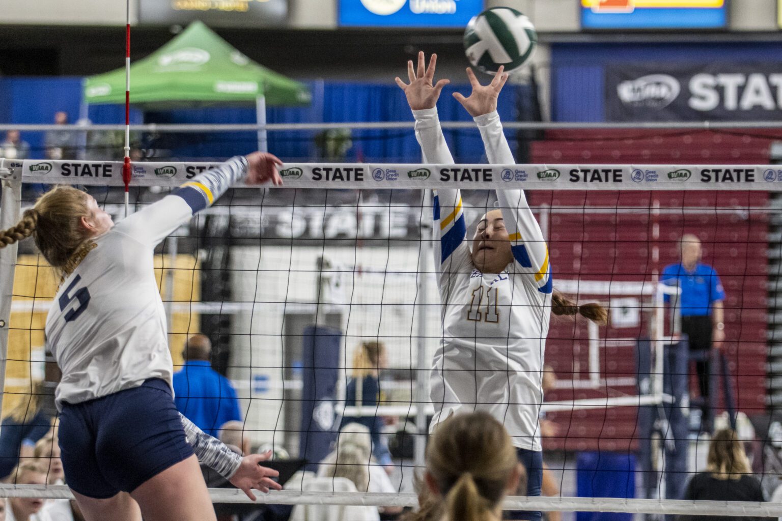 Ferndale's Jillia Fox (11) attempts to block a Mead shot during the 3A state quarterfinals at the Yakima Valley SunDome on Nov. 17.