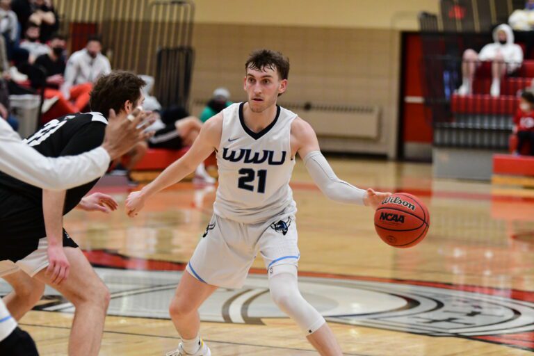 Western junior guard Lucas Holden led the Vikings with 13 points in a 70-59 loss to Western Oregon in the opening round of the GNAC tournament in Lacey on Wednesday.
