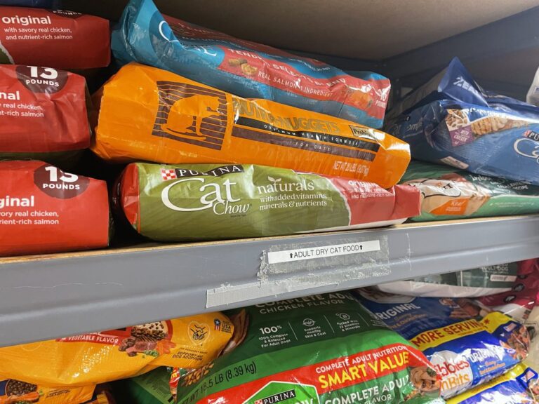 Donated cat food sits on a shelf at the Whatcom Humane Society on Aug. 26. The organization's pet food bank is running low and seeking donations from the community.