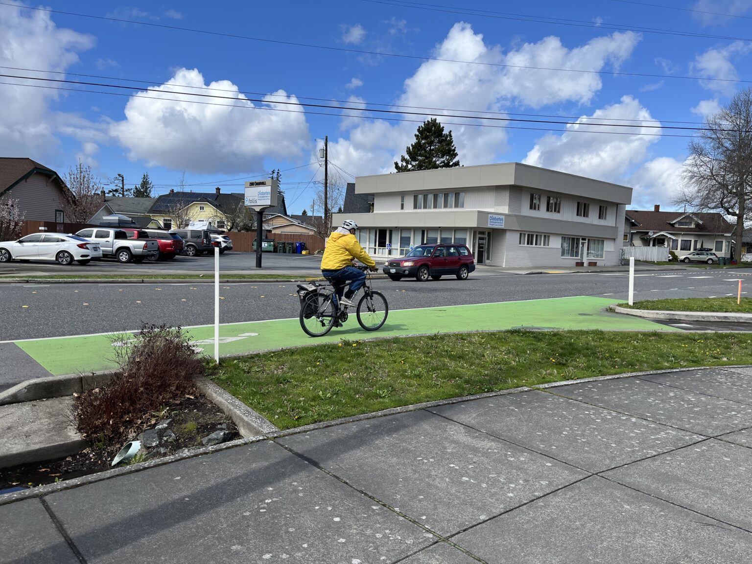 A cyclist travels along a bike lane on Cornwall Avenue April 11 in Bellingham.